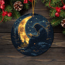 Bigfoot Reading On A Crescent Moon Mica Circle Ornament