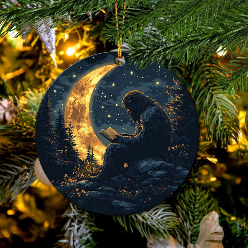 Bigfoot Reading On A Crescent Moon Mica Circle Ornament