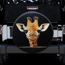 Baby Giraffe Peeking Over A Black Wall Car Spare Tire Cover