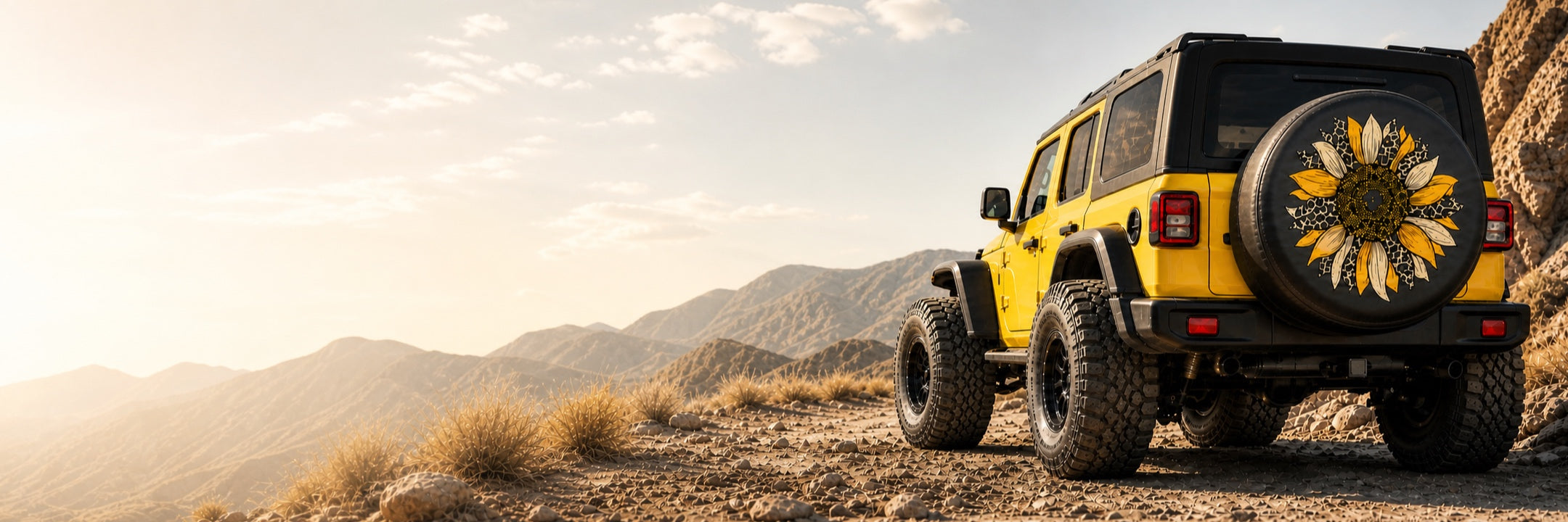 Yellow off-road vehicle featuring a sunflower spare tire cover